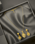 Elegant Gold-Toned Paisley Pendant Set with Earrings - Sitarahub Sitarahub,