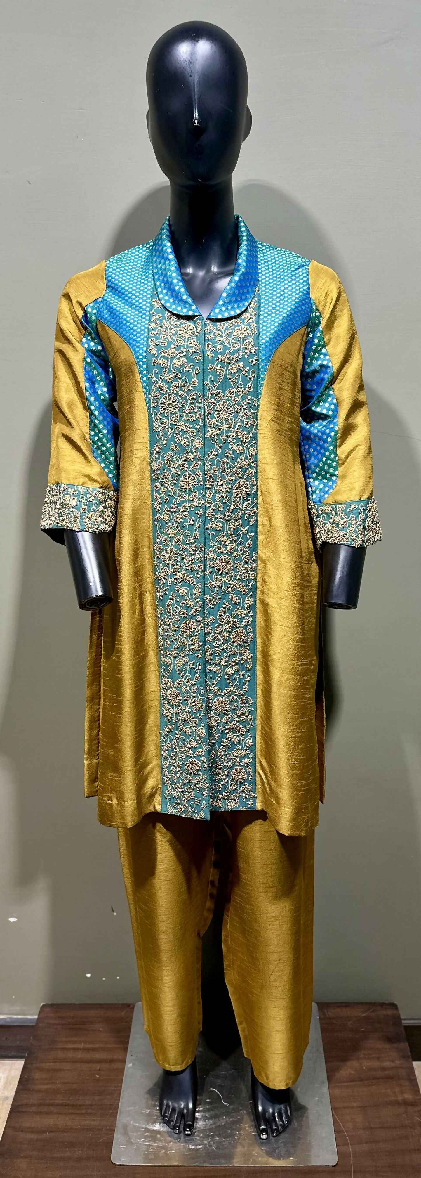 Mustard shirt with front embroidery panels and brocade patch in the sleeves and collar